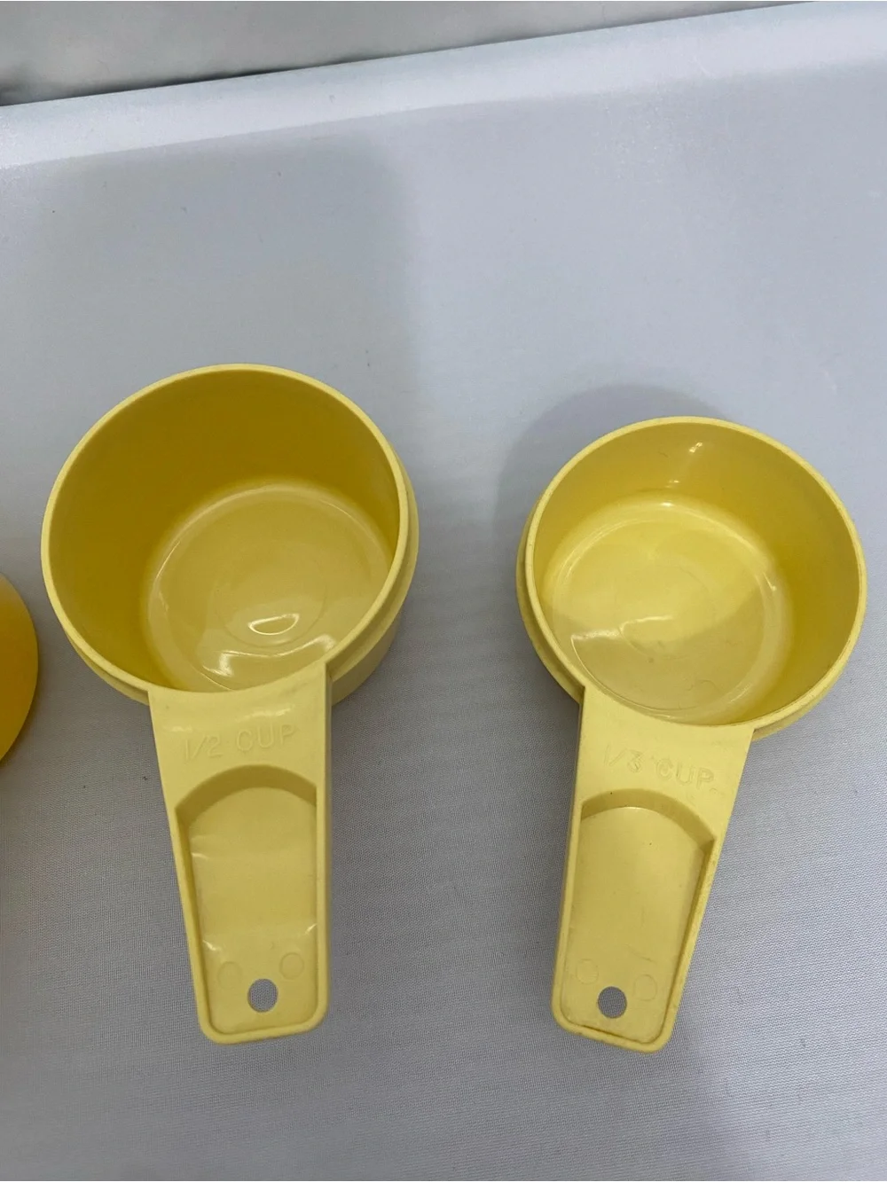 Yellow Plastic Measuring Cups